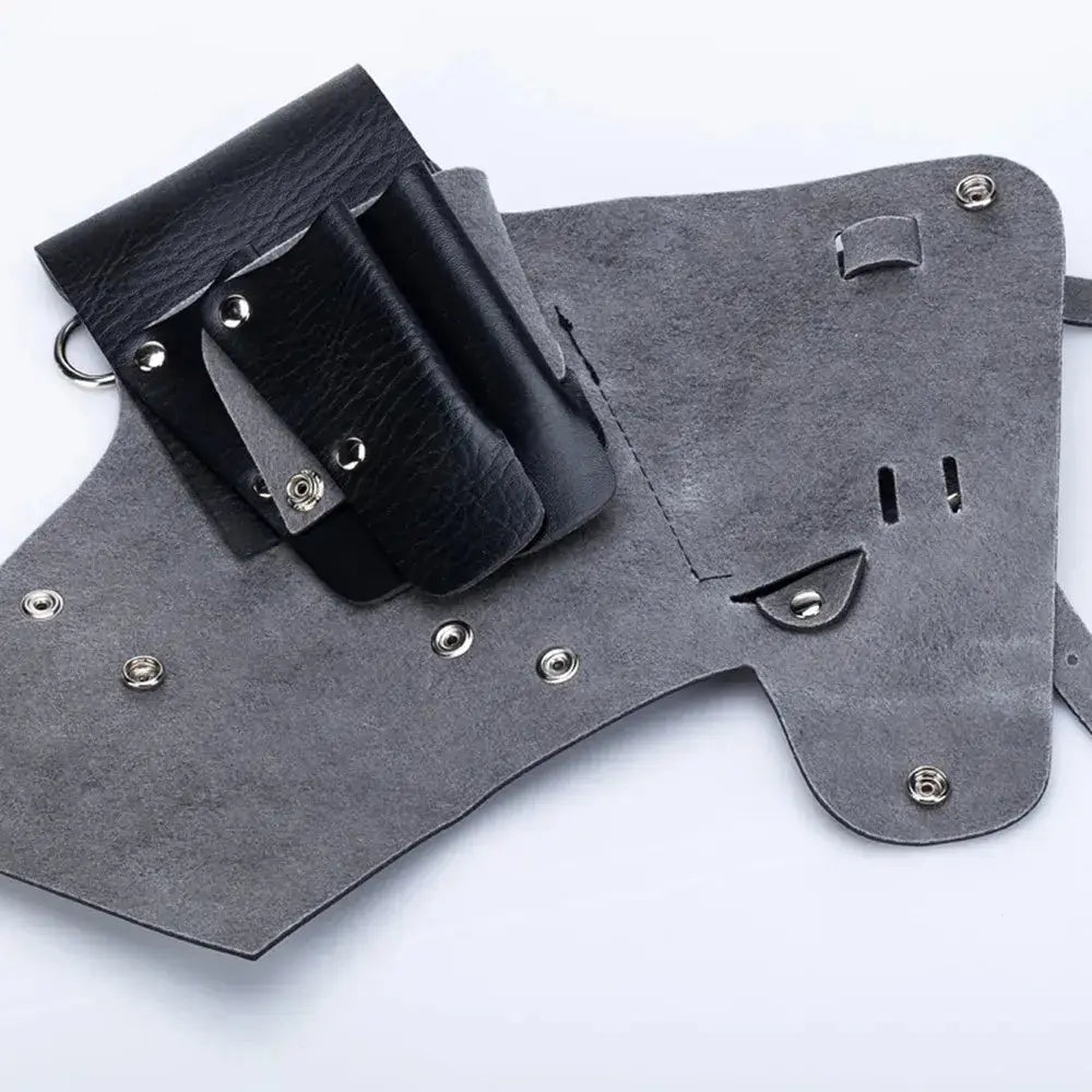 Eco leather hairdressing barber bag for accessories with premium hardcover design and secure snap closures for scissors protection.