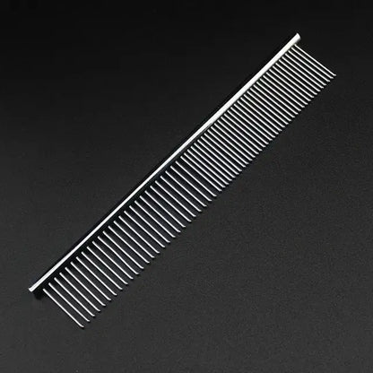 Professional aluminum hairdressing comb on black background, ideal for barbers and hairdressers seeking durability and precision.